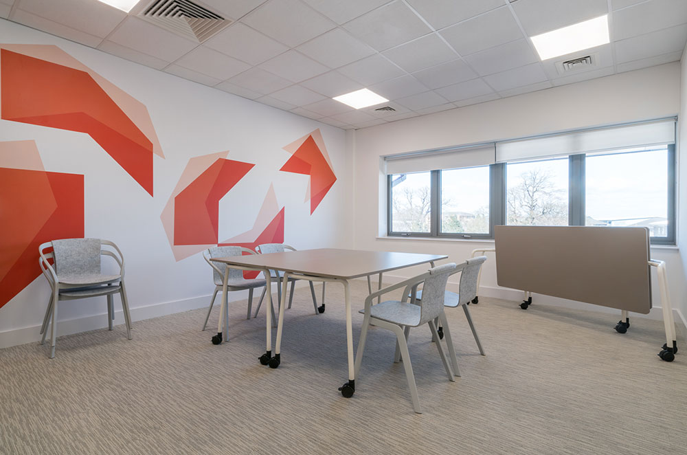 Meeting room with folding tables and stacking chairs