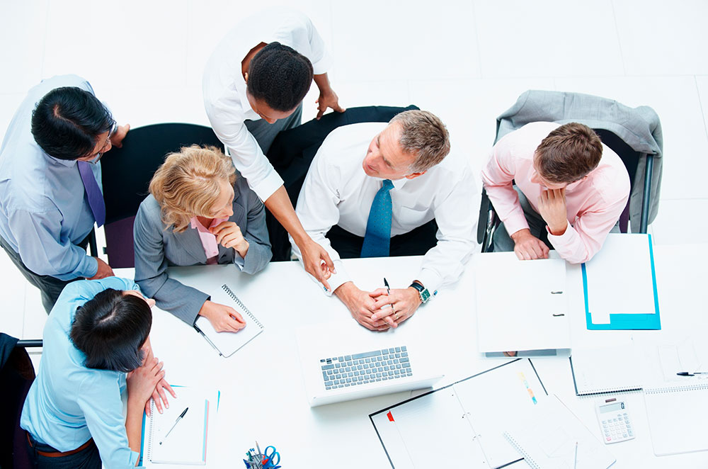 workers attending a meeting and talking