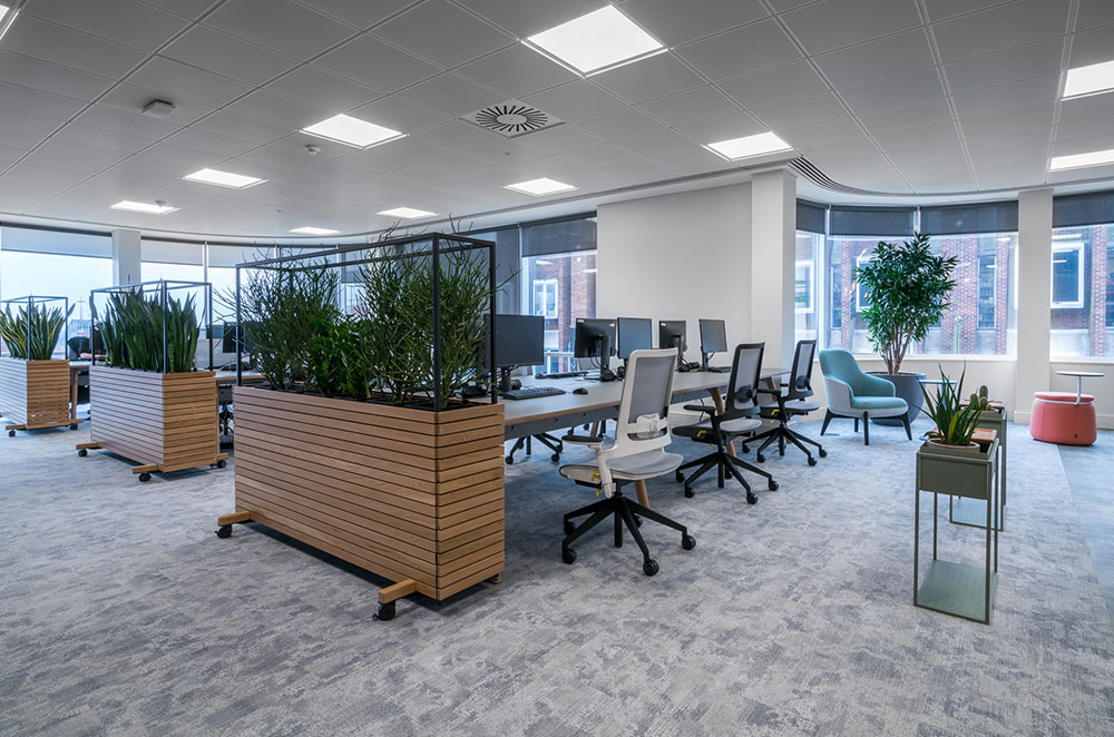 open place office with bench desk and task chairs