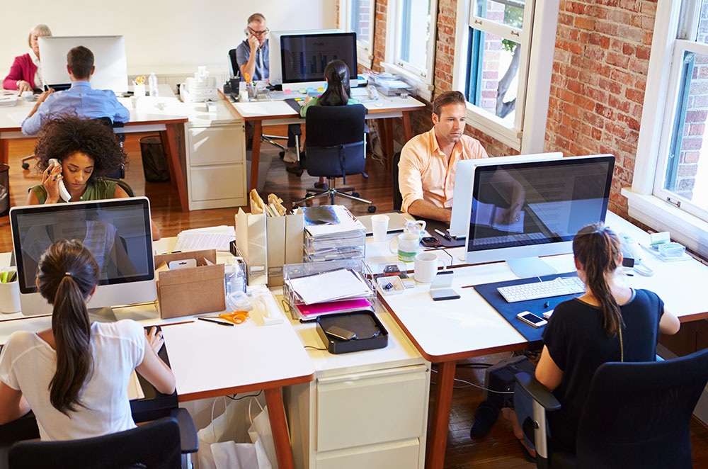 Top view of overcrowded and messy office space